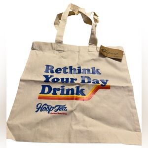 “Hoop Tea” cotton canvas tote in natural. NWT